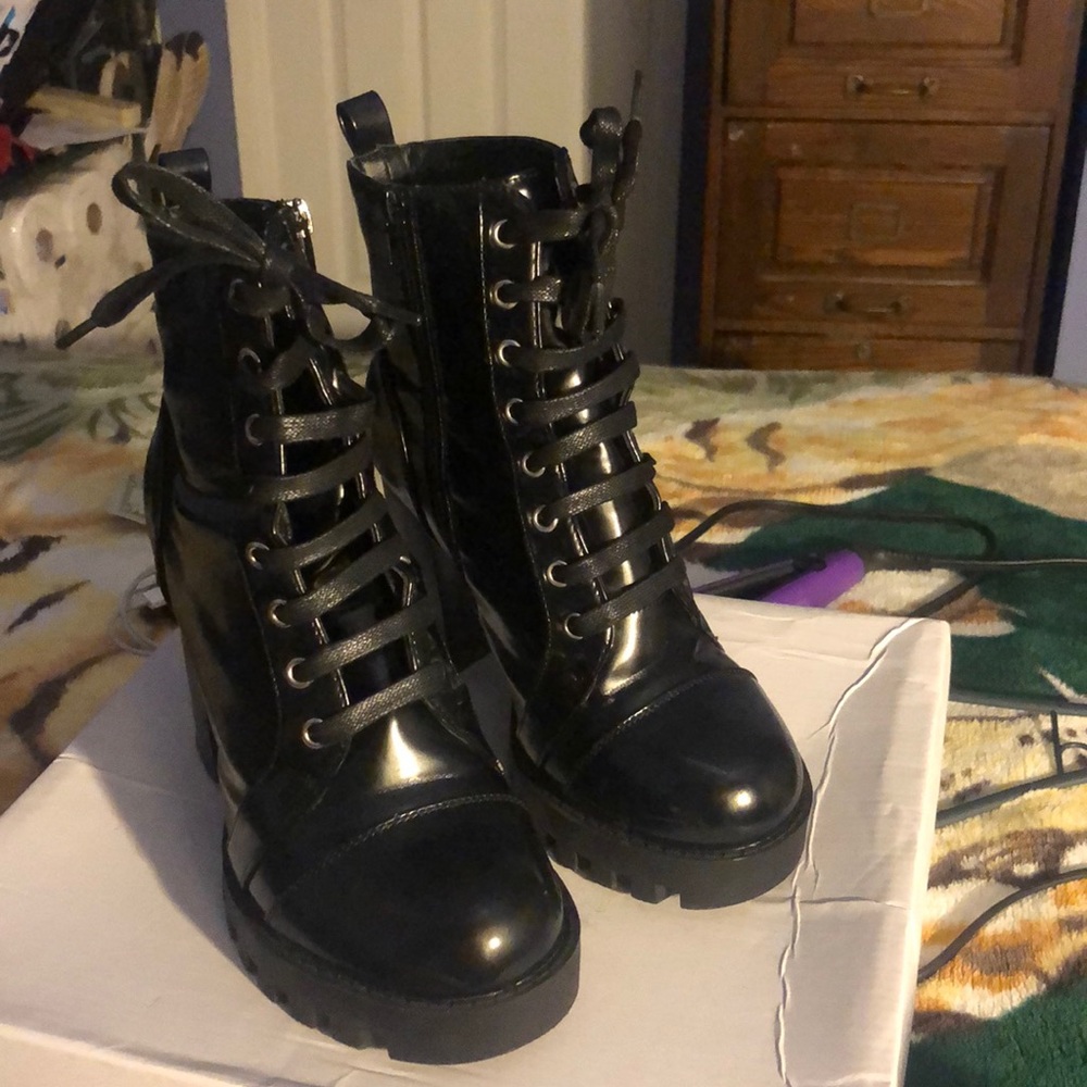 Black heeled combat boots